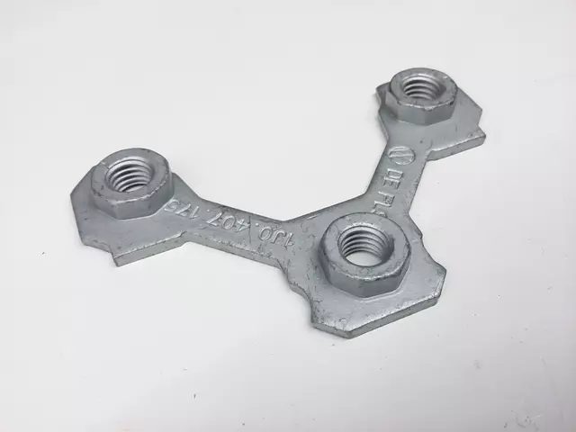 1J0407175B - Suspension: Lower Control Arm Lock Plate for Volkswagen: Beetle, Golf, Jetta, Passat Image