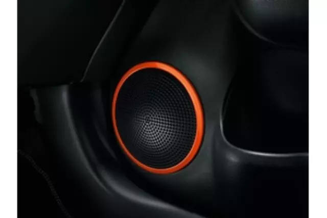 999G344104 - Interior: Speaker Rings - Orange for Nissan: Versa Image