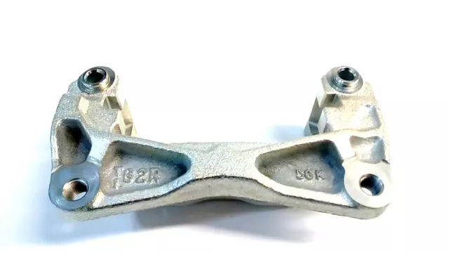 26225AG120 - : FRONT CALIPER SUPPORT BRACKET [PASSENGERS SIDE ] FOR DUAL-PISTON TYPE for Subaru Image