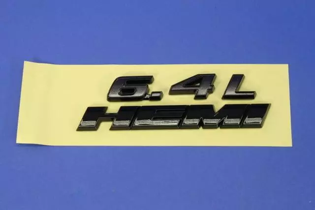 68253201AA - Exterior Ornamentation: Front Fender Nameplate for Mopar Image