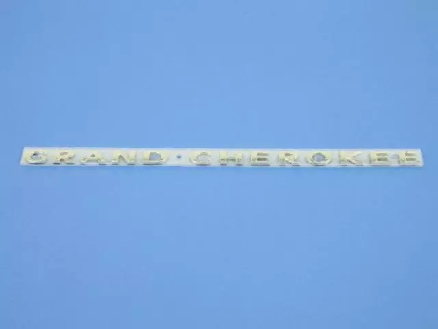 68088725AA - Exterior Ornamentation: Front Door Nameplate for Mopar Image