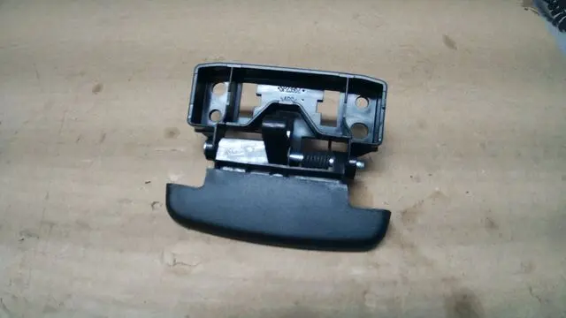 68470797AA - Interior Trim: Armrest Lid Latch for Mopar Image