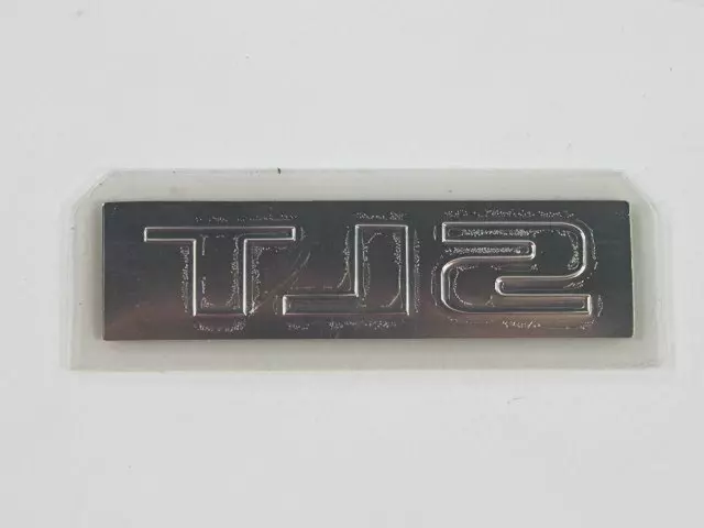 5182440AA - Exterior Ornamentation: Rear Door Nameplate for Mopar Image