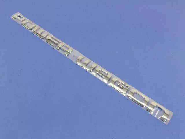 55077758AA - Exterior Ornamentation: Nameplate for Mopar Image