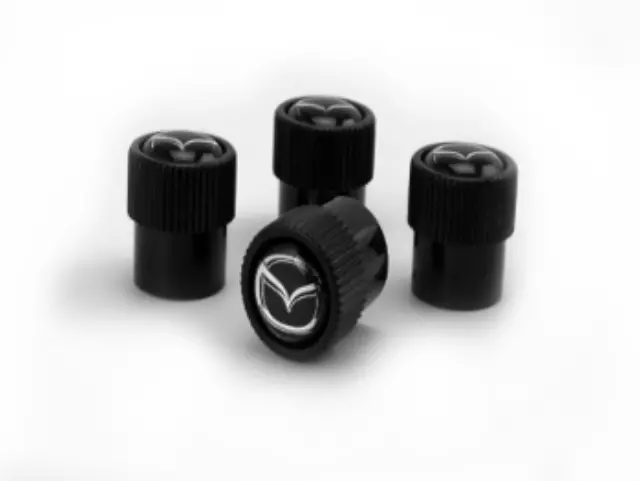 C9N2V3820 - Wheels: Valve Stem Caps, Black for Mazda: 2, 3, 5, 6, CX-3, CX-30, CX-5, CX-50, CX-7, CX-70, CX-9, CX-90, MPV, MX-30 EV, MX-5 Miata, RX-8, Tribute Image