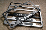 999MBANNISSA - Exterior: License Plate Frame (With Nissan Logo) for Nissan: 350Z, Altima, Armada, Frontier, Maxima, Murano, Pathfinder, Quest, Rogue, Sentra, TITAN, Versa, Xterra Image