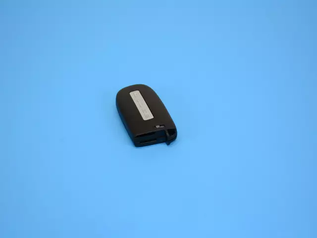Integrated Key Fob Transmitter - Mopar (68051387AH)