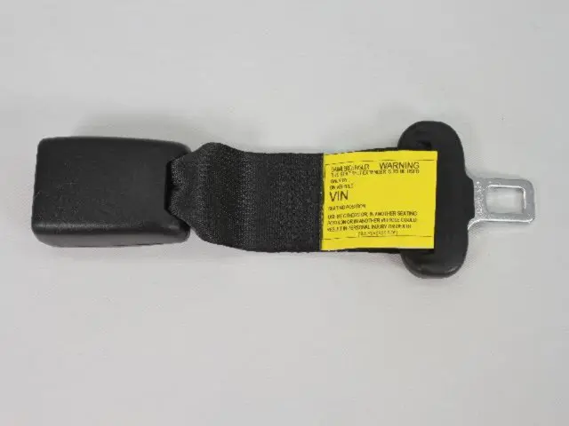 5135197AA - Interior Trim: Seat Belt Extender for Chrysler: 300, Aspen | Dodge: Challenger, Charger, Dakota, Durango, Magnum, Ram 1500, Ram 2500, Ram 3500 | Jeep: Grand Cherokee, Wrangler, Wrangler JK | Ram: Dakota Image