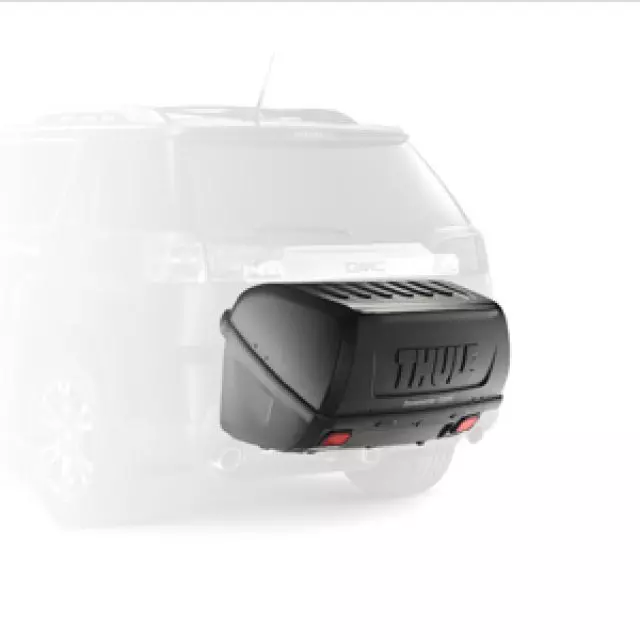 19257871 - Cargo Management - Exterior: Hitch Mounted Cargo Box By Thuleandreg for Buick: Enclave, Envision | Cadillac: CTS, Escalade, Escalade ESV, Escalade EXT, SRX, XT4, XT5, XT6 | Chevrolet: Avalanche, Blazer, Colorado, Equinox, Express 1500, Express 2500, Express 3500, Express 4500, HHR, Silverado 1500, Silverado 1500 Classic, Silverado 1500 HD Classic, Silverado 1500 LTD, Silverado 2500 HD, Silverado 2500 HD Classic, Silverado 3500 Classic, Silverado 3500 HD, Suburban, Suburban 1500, Suburban 2500, Suburban 3500 HD, Tahoe, Trailblazer, Traverse | GMC: Acadia, Acadia Limited, Canyon, Envoy, Savana 1500, Savana 2500, Savana 3500, Savana 4500, Sierra 1500, Sierra 1500 Classic, Sierra 1500 HD Classic, Sierra 1500 Limited, Sierra 2500 HD, Sierra 2500 HD Classic, Sierra 3500 Classic, Sierra 3500 HD, Terrain, Yukon, Yukon XL, Yukon XL 1500, Yukon XL 2500 Image
