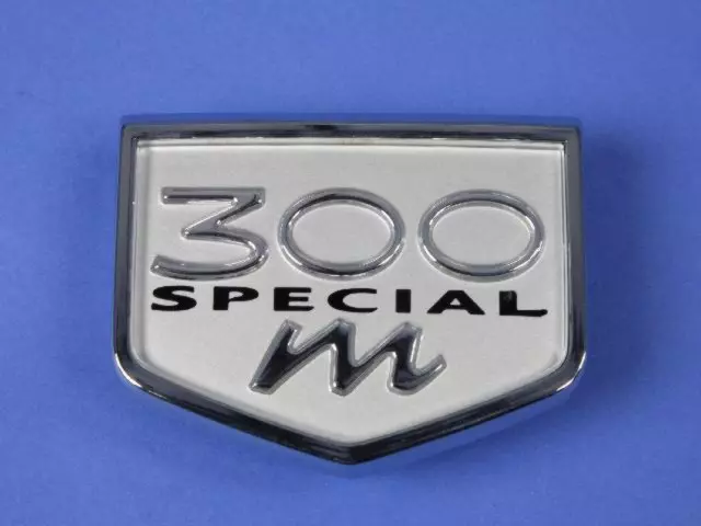 4805762AA - Exterior Ornamentation: Fender Medallion for Chrysler: 300M, Concorde | Dodge: Intrepid Image