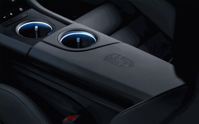 9J1867165AAA11 - Interior: Porsche Crest On Lid Of Storage Compartment for Porsche: Taycan Image