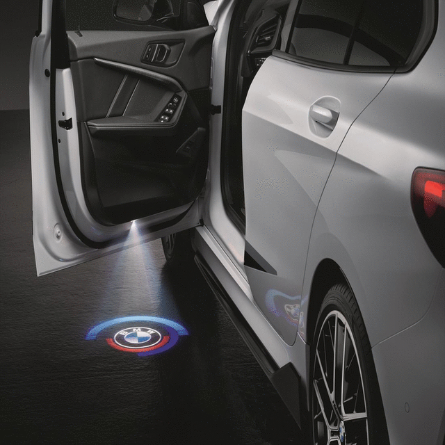 63315A64018 - Exterior: 50 Years M Led Door Projectors (50mm) for BMW: 230i, 330e, 330i, 430i, M240i, M340i, M4 Image