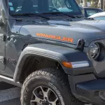 68663284AA - : Jeep Wrangler Logo Graphic, Orange, sold by Visco for Affiliated Accessories Image