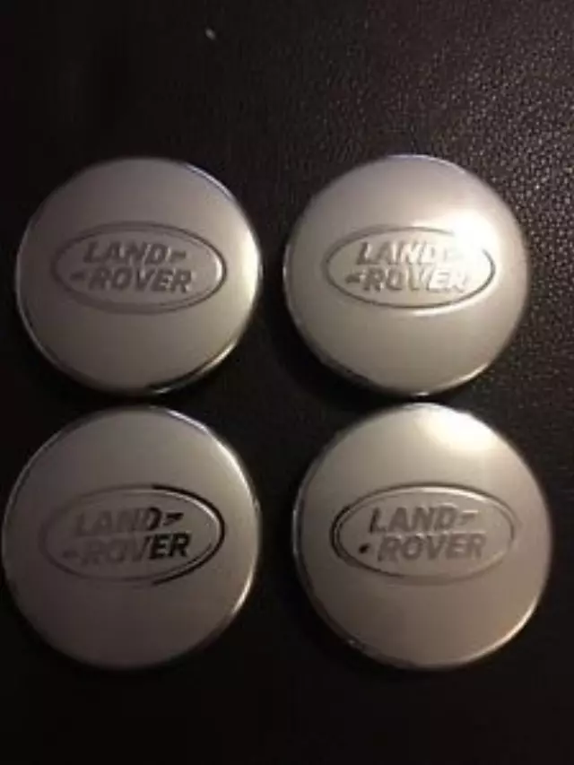 LR094546 - : Wheel Center Cap - Satin Silver Finish for Land Rover: Defender 110, Defender 130, Defender 90, Discovery, Freelander, LR2, LR3, LR4, Range Rover, Range Rover Sport, Range Rover Velar Image