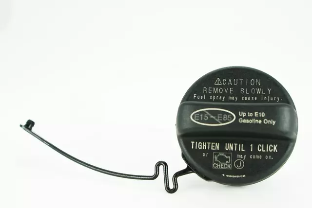 7730006040 - Fuel System: Filler Cap for Scion: tC, xA, xB, xD | Toyota: 4Runner, Avalon, Camry, Corolla, FJ Cruiser, Highlander, Land Cruiser, Matrix, RAV4, Sequoia, Sienna, Solara, Tacoma, Tundra, Venza, Yaris Image