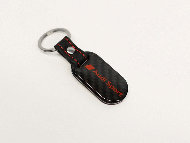ZAW087610A - Miscellaneous: Key Chain - Audi Sport Carbon Fiber for Audi: A3, A3 Quattro, A4 allroad, A4 Quattro, A5 Quattro, A5 Sportback, A6 allroad, A6 Quattro, A7 Sportback, A8 Quattro, e-tron GT, Q3, Q4 e-tron, Q5, Q5 Sportback, Q7, Q8, R8, RS e-tron GT, RS3, RS5, RS5 Sportback, S3, S4, S5, S5 Sportback, S6, S8, SQ5, SQ5 Sportback, SQ7, SQ8, TT Quattro, TT RS Quattro, TTS Quattro Image