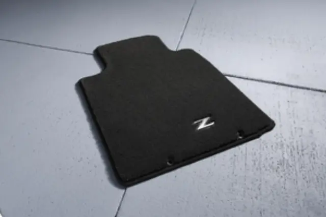 999E2ZV002 - Interior: Floor Mats, Carpet, Metal Z Logo for Nissan: 350Z, 370Z, Altima, NV3500 Image