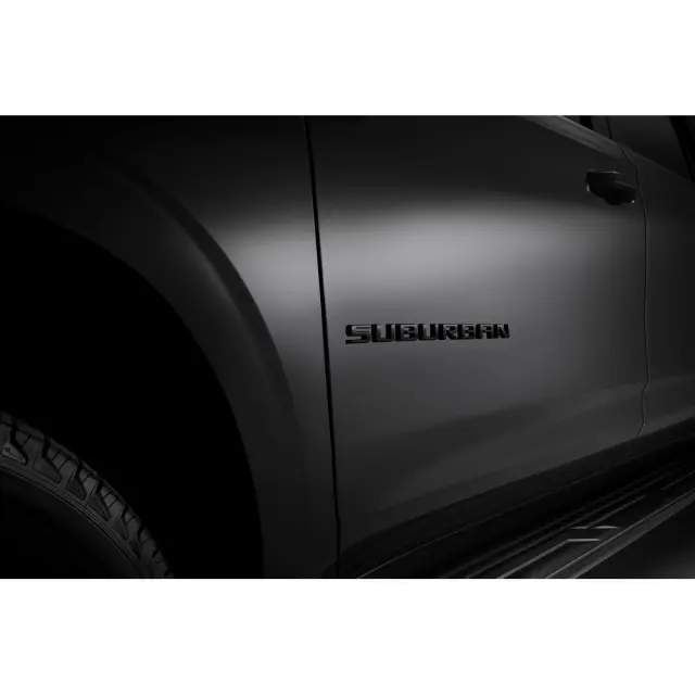 86533388 - Exterior: Suburban Emblems - Black for GM Image