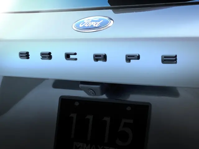 VLV4Z9942528A - Exterior: Badge Overlay Kit - Matte Black for Ford: Escape Image