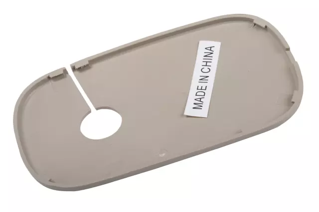 22815109 - : Part# 22815109 Shale Driver Side Sun Visor Support Bolt Cover for Cadillac: Escalade, Escalade ESV | Chevrolet: Silverado 1500, Silverado 1500 LD, Silverado 2500 HD, Silverado 3500 HD, Suburban, Tahoe | GMC: Sierra 1500, Sierra 1500 Limited, Sierra 2500 HD, Sierra 3500 HD, Yukon, Yukon XL Image