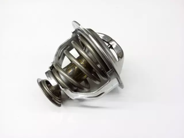 6J121113A - Cooling System: Engine Coolant Thermostat for Audi: A3, A3 Quattro, A4, A4 Quattro, A5, A5 Quattro, Q5, TT Quattro Image