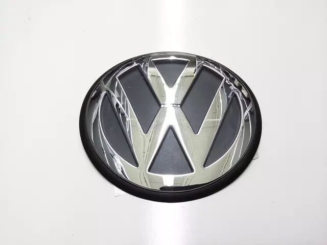 Emblem - Volkswagen (1C0-853-601-WM7)