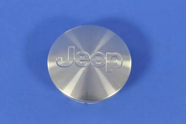 52090402AB - Mopar Accessories - Component Parts: Wheel Center Cap for Jeep: Commander, Compass, Grand Cherokee, Liberty, Patriot, Wrangler, Wrangler JK Image