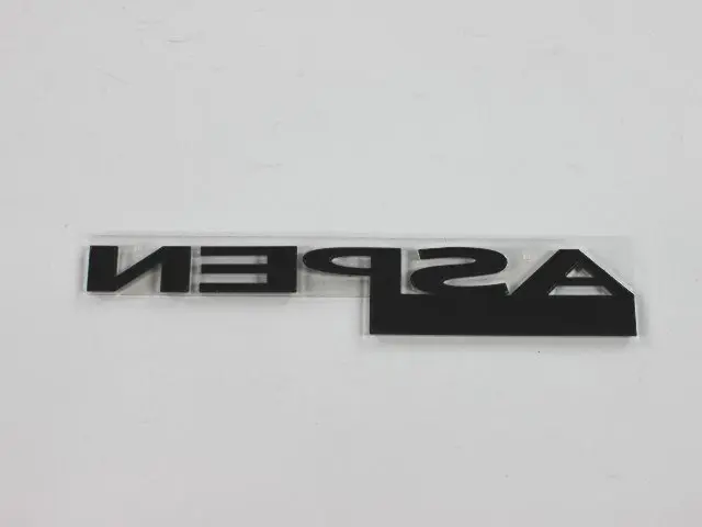 55364656AA - Exterior Ornamentation: Nameplate for Mopar Image