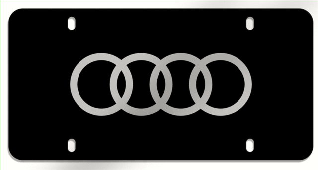 ZAW072850A - Exterior: 2016-2025 Audi - Polycarbonate Audi Rings Vanity Plate - Black for Audi: A3, A3 Quattro, A3 Sportback e-tron, A4 allroad, A4 Quattro, A5 Quattro, A5 Sportback, A6 allroad, A6 Quattro, A7 Quattro, A7 Sportback, A8 Quattro, allroad, e-tron GT, Q3, Q4 e-tron, Q5, Q5 Sportback, Q7, Q8, R8, RS e-tron GT, RS3, RS5, RS5 Sportback, RS7, S3, S4, S5, S5 Sportback, S6, S7, S8, SQ5, SQ5 Sportback, SQ7, SQ8, TT Quattro, TT RS Quattro, TTS Quattro Image
