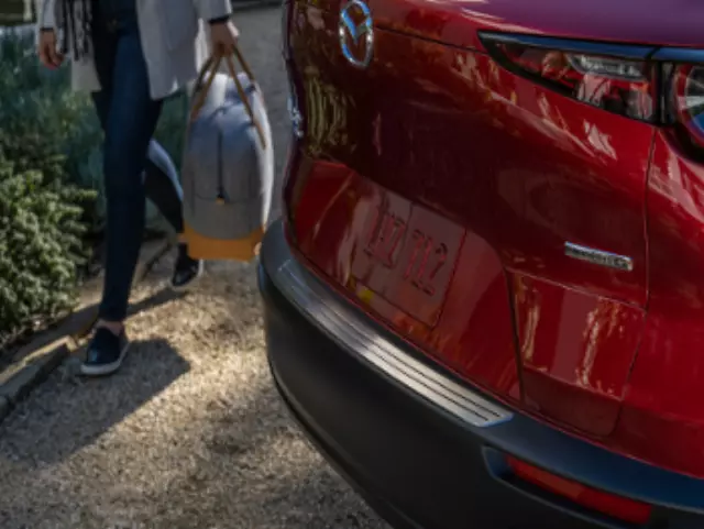 DGH9V4080A - Exterior: Rear Bumper Guard - Stainless Steel for Mazda Image