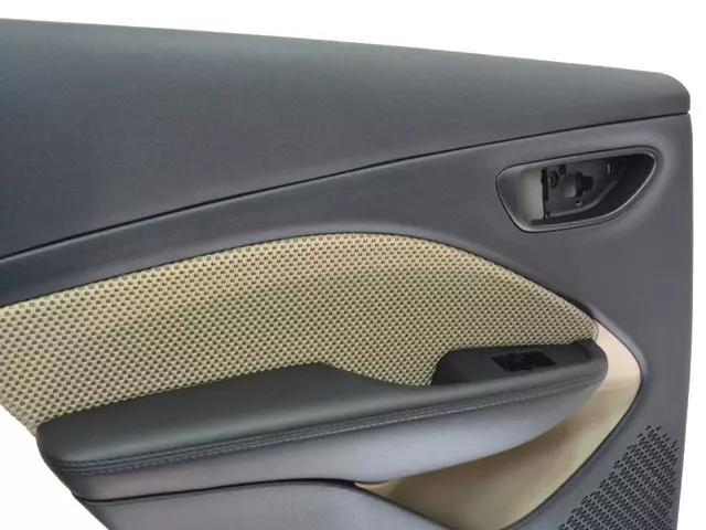 Rear Door Trim Panel, Left - Mopar (5UQ591XLAA)