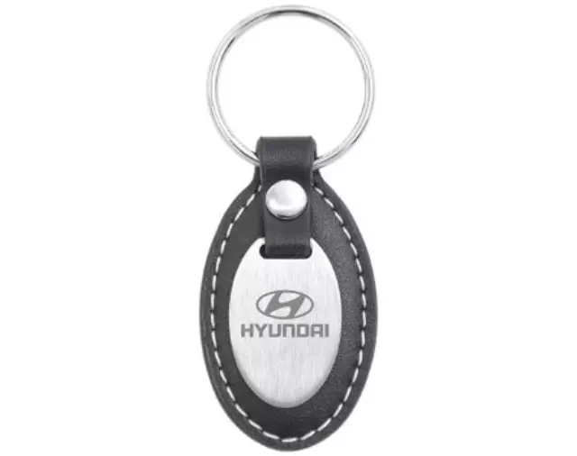 40224410 - Merchandise: Leather Oval W/ An Oval Metal Plaque On The for Hyundai Image