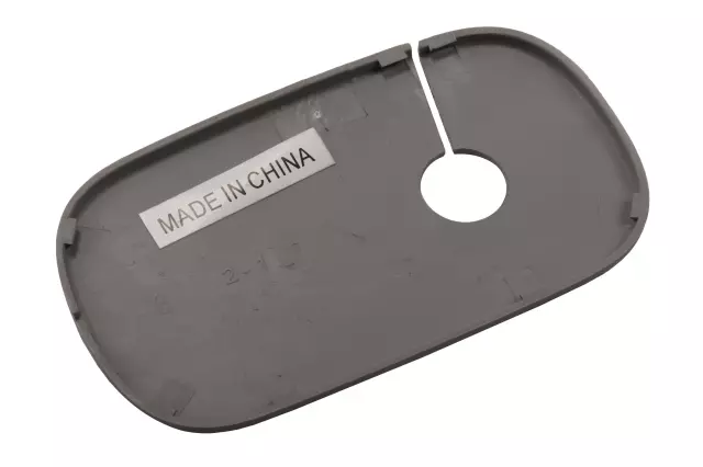 22815112 - : Light Ash Gray Passenger Side Sunshade Support Bolt Cover for Cadillac: Escalade, Escalade ESV | Chevrolet: Silverado 1500, Silverado 1500 LD, Silverado 2500 HD, Silverado 3500 HD, Suburban, Tahoe | GMC: Sierra 1500, Sierra 1500 Limited, Sierra 2500 HD, Sierra 3500 HD, Yukon, Yukon XL Image