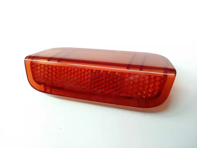 1K0947419A - : Door Interior Reflector for Volkswagen: Arteon, Atlas, Atlas Cross Sport, CC, e-Golf, Eos, Golf, Golf Alltrack, Golf R, Golf SportWagen, GTI, Jetta, Passat, R32, Rabbit, Tiguan, Tiguan Limited, Touareg Image