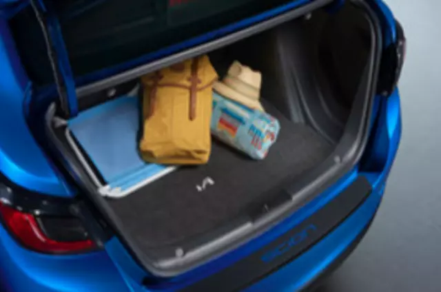 PT2061M16020 - Cargo Management: OEM NEW Rear Carpet Cargo Area Mat Black 2017-2018 Toyota Yaris iA for Scion: iA | Toyota: Yaris iA Image