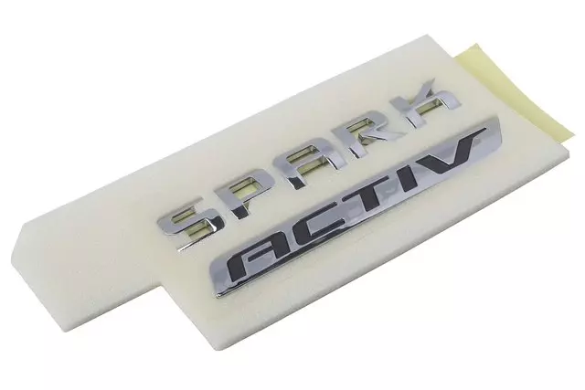 42476000 - : Driver Side Liftgate Spark and ACTIV Logo for Chevrolet: Spark Image