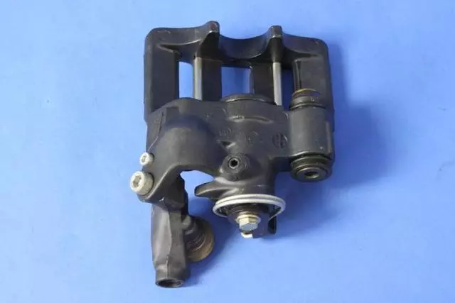 Disc Brake Caliper, Left - Mopar (5093309AA)