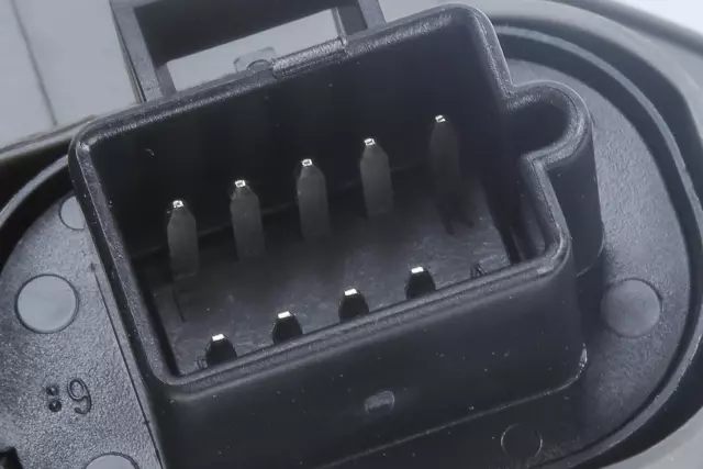 Dark Titanium Front Driver Side Window and Multi-Function Switch Bezel - GM (20952787)