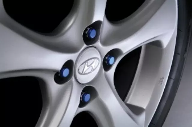U840200100 - Exterior: Colored Spline Drive Lugs, Blue for Hyundai: Accent Image