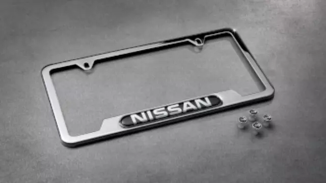 T99MB6TA0A - Exterior: License Plate Frame And Valve Stem Caps Set for Nissan: Frontier, Maxima, Pathfinder, Rogue Image