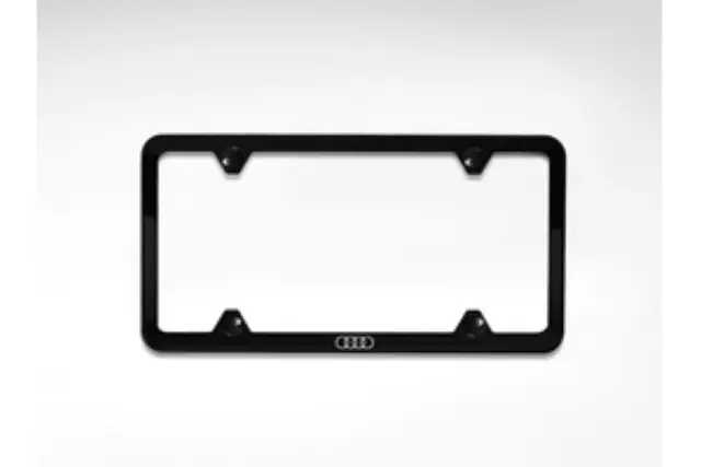 ZAW071801C - Exterior: 2013-2025 Audi - Slimline License Plate Frame With Audi Rings for Audi: A3, A3 Quattro, A3 Sportback e-tron, A4 allroad, A4 Quattro, A5 Quattro, A5 Sportback, A6 allroad, A6 Quattro, A7 Quattro, A7 Sportback, A8 Quattro, allroad, e-tron GT, e-tron Sportback, Q3, Q4 e-tron, Q5, Q5 Sportback, Q7, Q8, Q8 e-tron, R8, RS e-tron GT, RS3, RS5, RS5 Sportback, RS7, S3, S4, S5, S5 Sportback, S6, S7, S8, SQ5, SQ5 Sportback, SQ7, SQ8, SQ8 e-tron, TT Quattro, TT RS Quattro, TTS Quattro Image