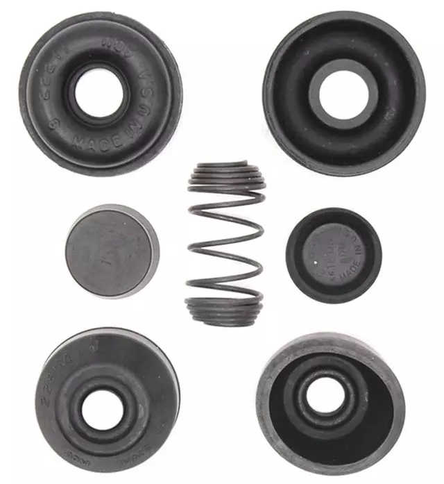 18031329 - : Rear Drum Brake Wheel Cylinder Repair Kit with Spring, Boots, and Caps for GM Image