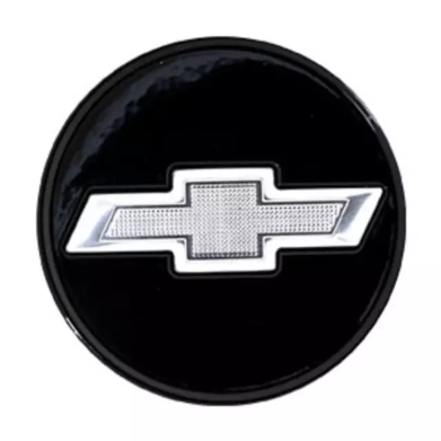 84245099 - Wheels: Wheel Center Cap, Black W\\/Silver Bowtie for Chevrolet: Silverado 1500, Silverado 1500 LD, Suburban, Suburban 3500 HD, Tahoe Image